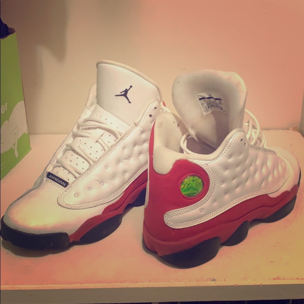 Jordan’s kids Youth 7 red white black tennis shoes